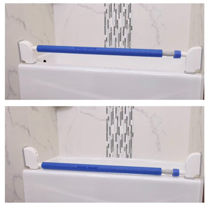 two side by side product photos of the StartSmart Safety Bar - a blue foam- covered tension bar with white end brackets - installed along the edge of a white bathtub against marble and mosaic tile walls. The images show the bar being raised and lowered. 